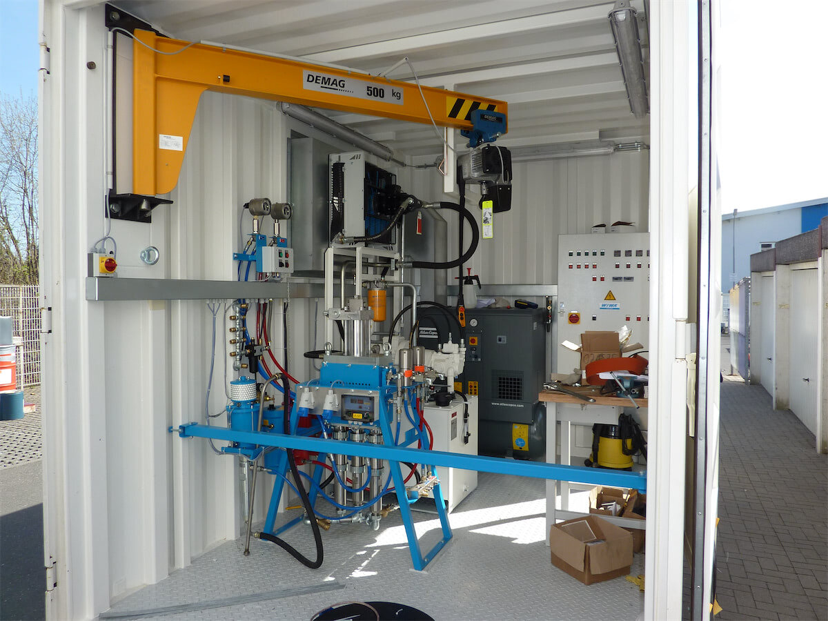 System integration of 2K coating system in container